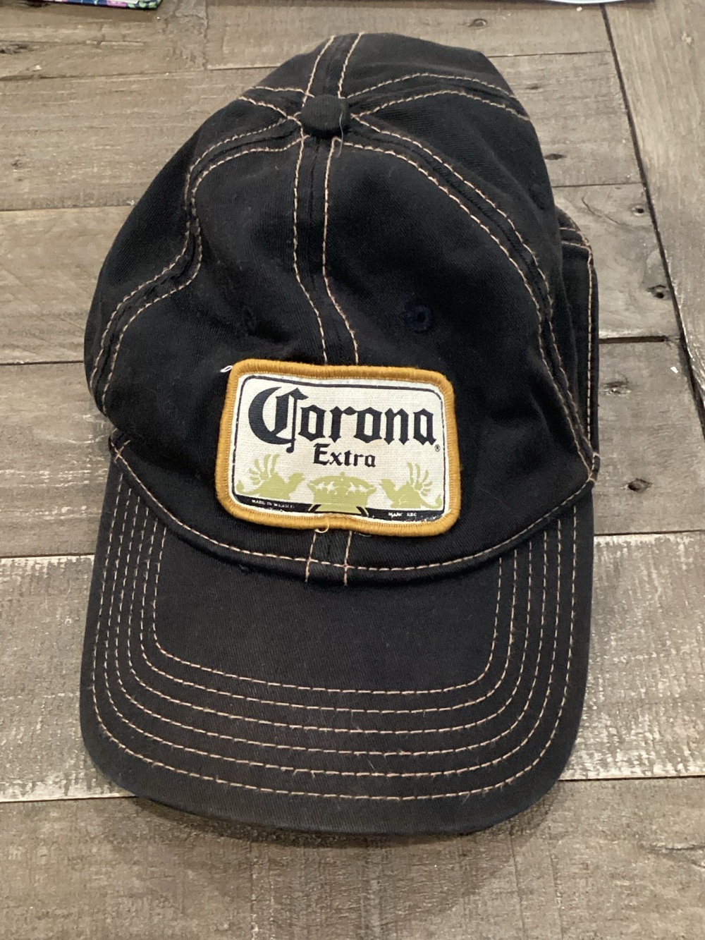 Corona black baseball cap with gold-trim patch